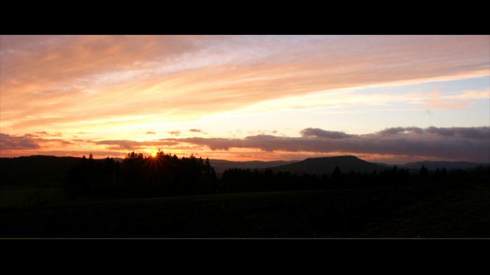 Stolov hora Osta - Zpad slunce nad Ostaem od Hv?zdy